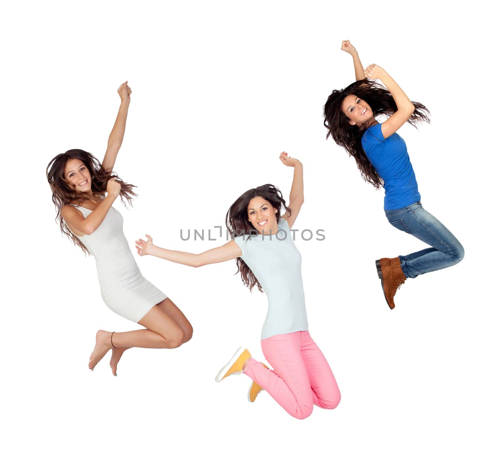 Three young girls jumping isolated on a white background