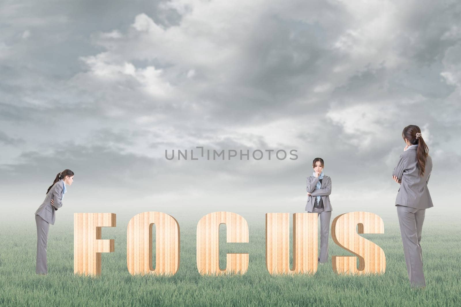 Concept of focus, point, center etc with 3d wooden text and businesswoman under copyspace sky. The Asian woman is the same one.