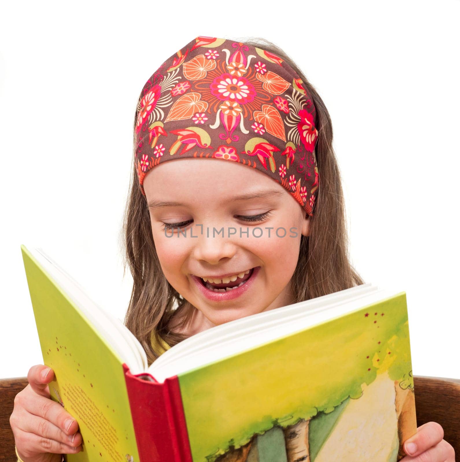 Child reads a book