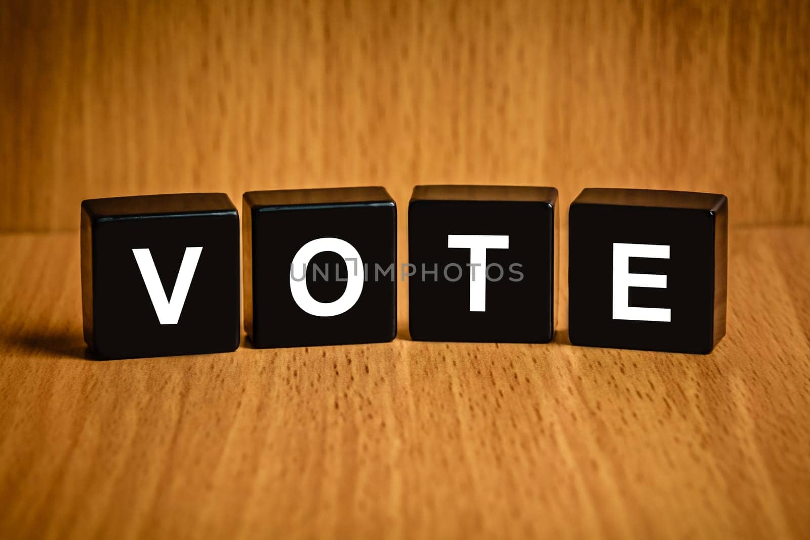 Vote text on black block
