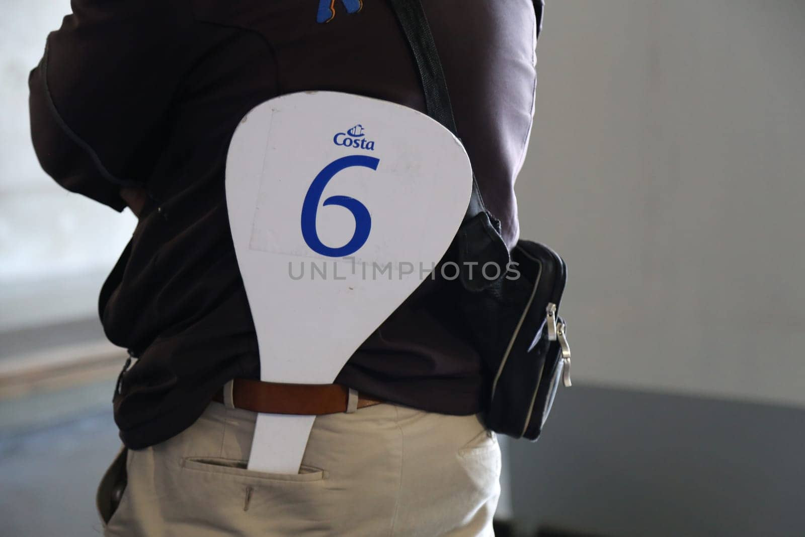 10 May 2019 Portugal Madeira Teleferico cable car station, men stand back number six, group guide tourism travel ship tourist travel. High quality photo