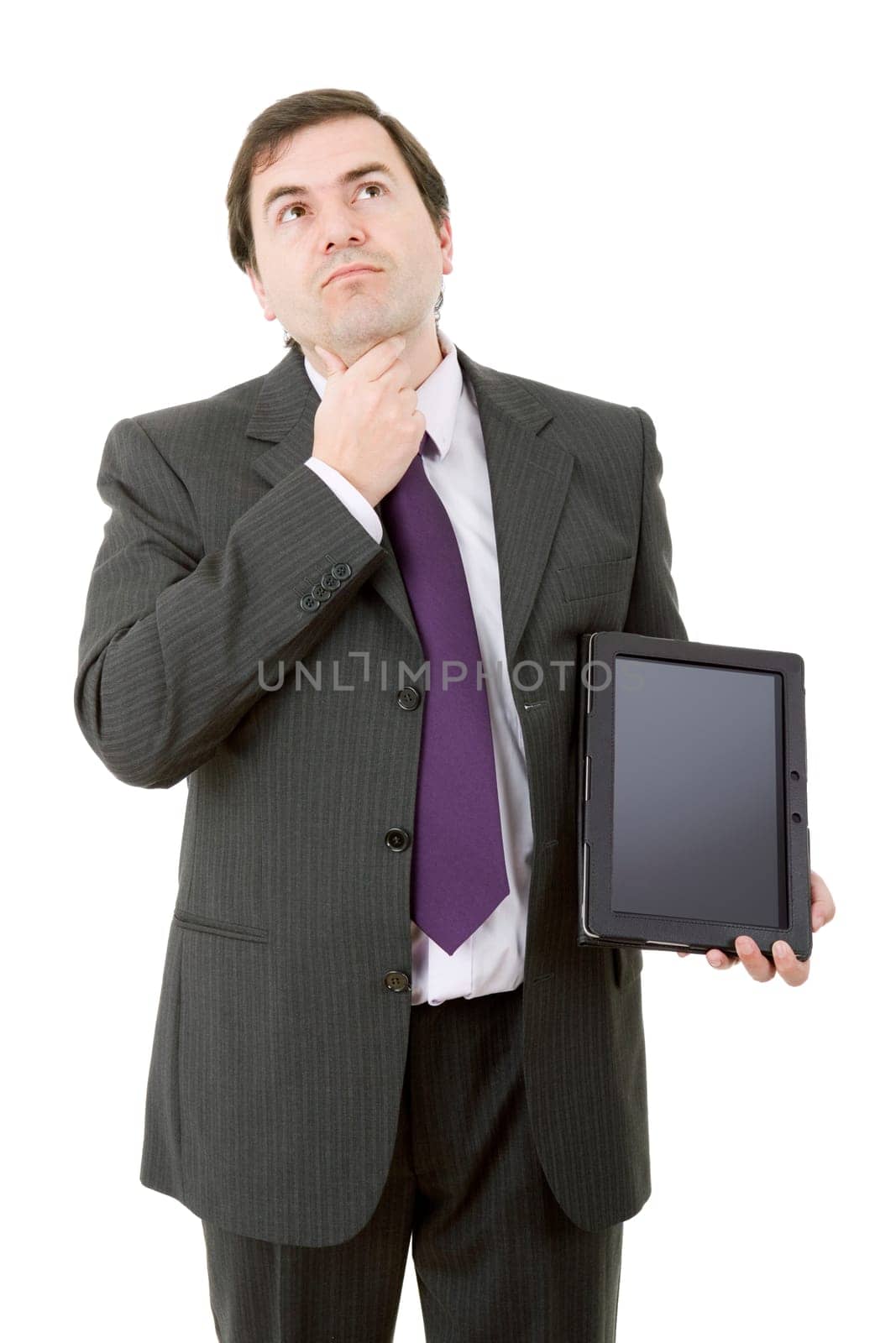 pensive businessman using a tablet pc, isolated