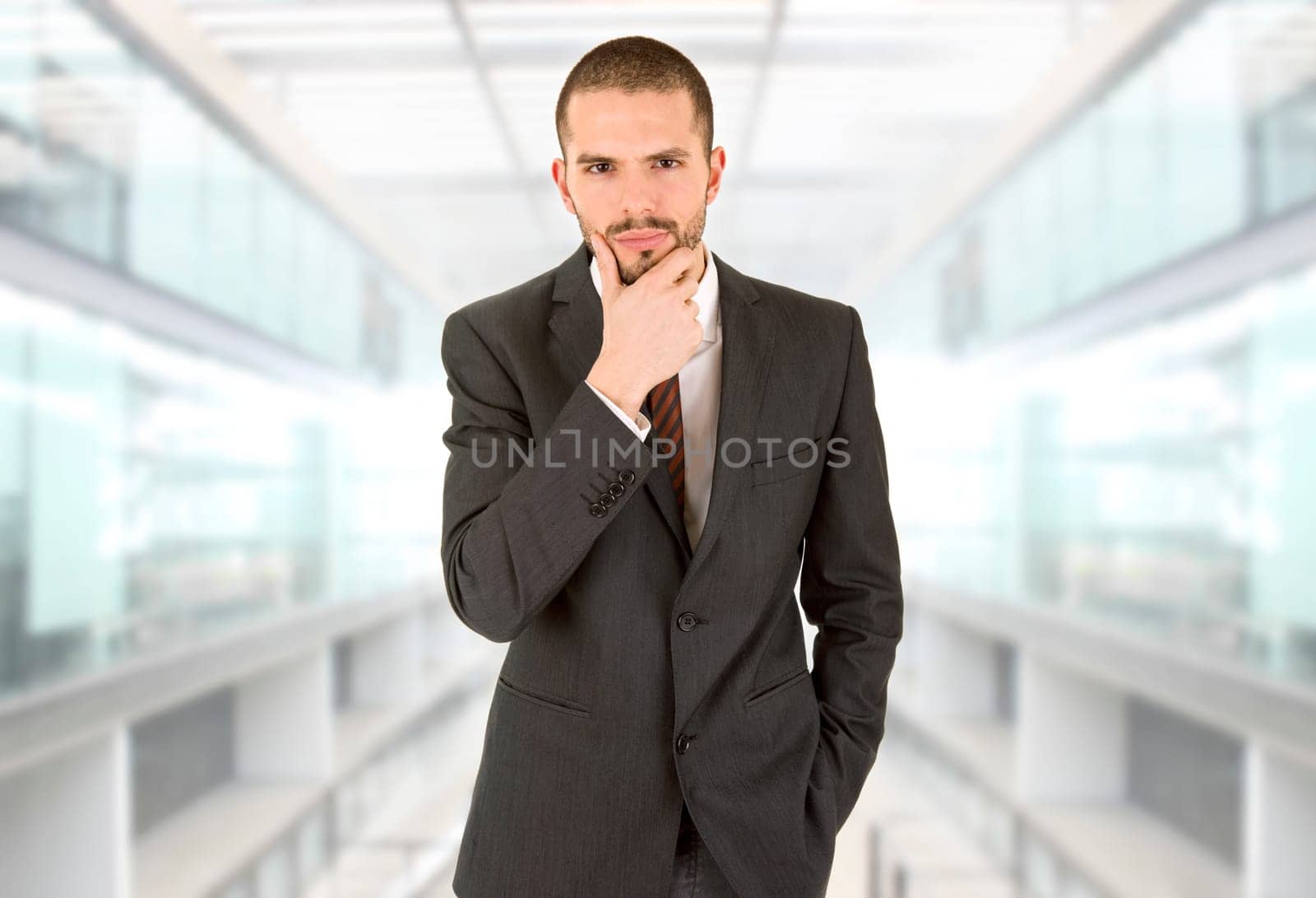 young business man portrait at the office