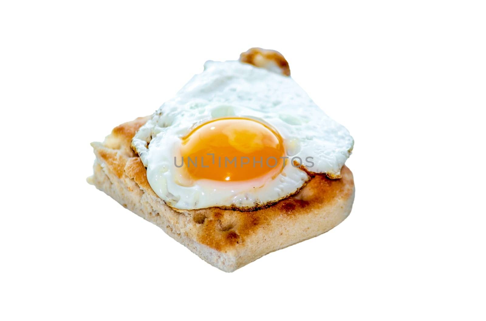 Quail egg as a fried egg on a small toast.