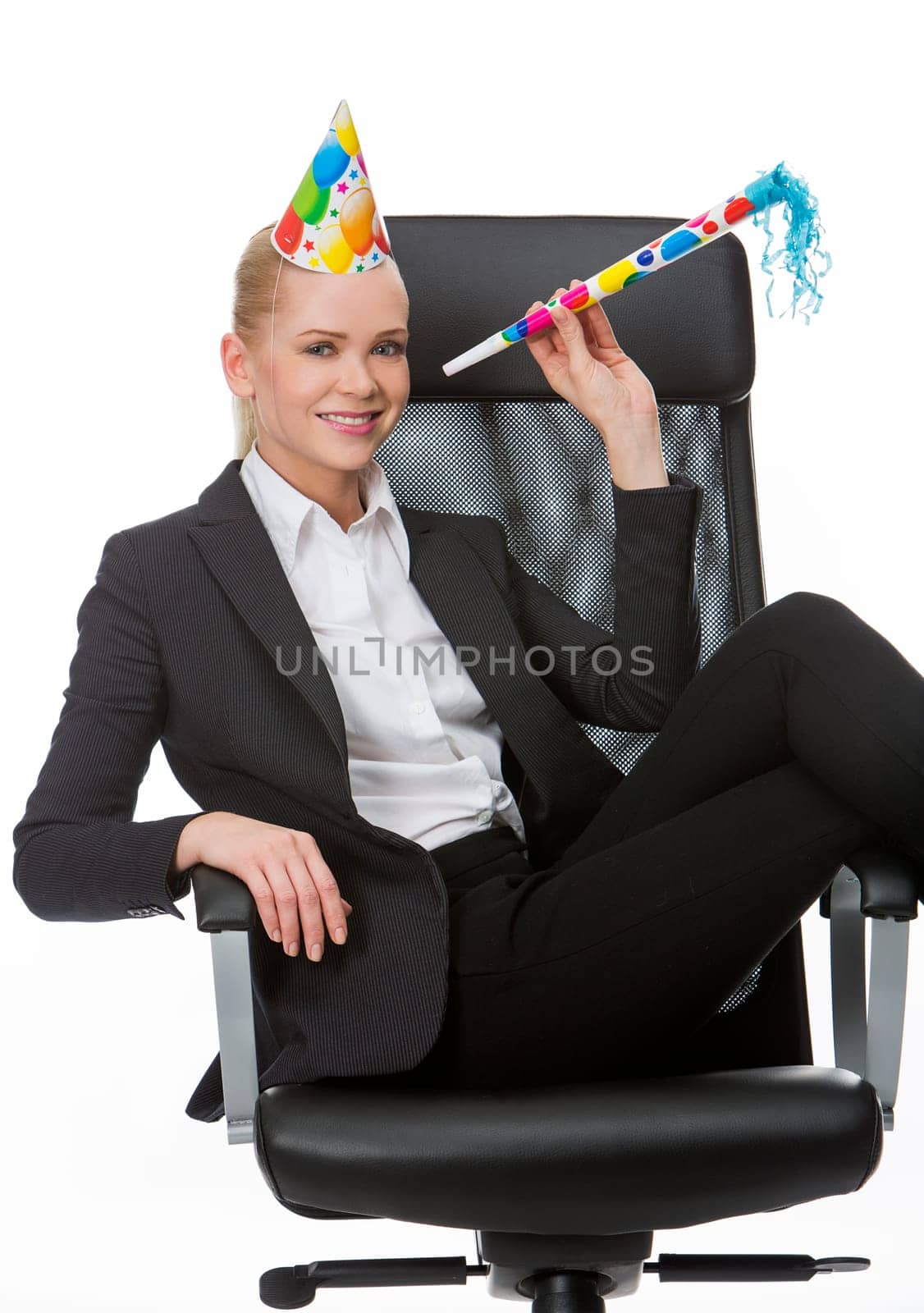 blonde businesswoman smiling and having fun during a party in the office