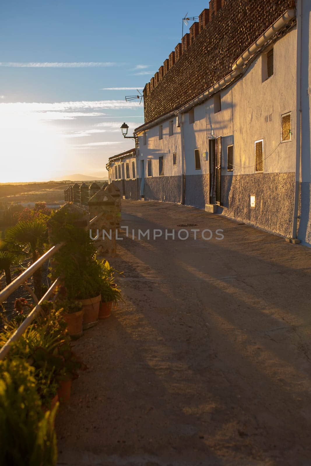 Galisteo, beautiful walled town from Alagon Valley. Whitewashed house attached to wall. Extremadura, Spain