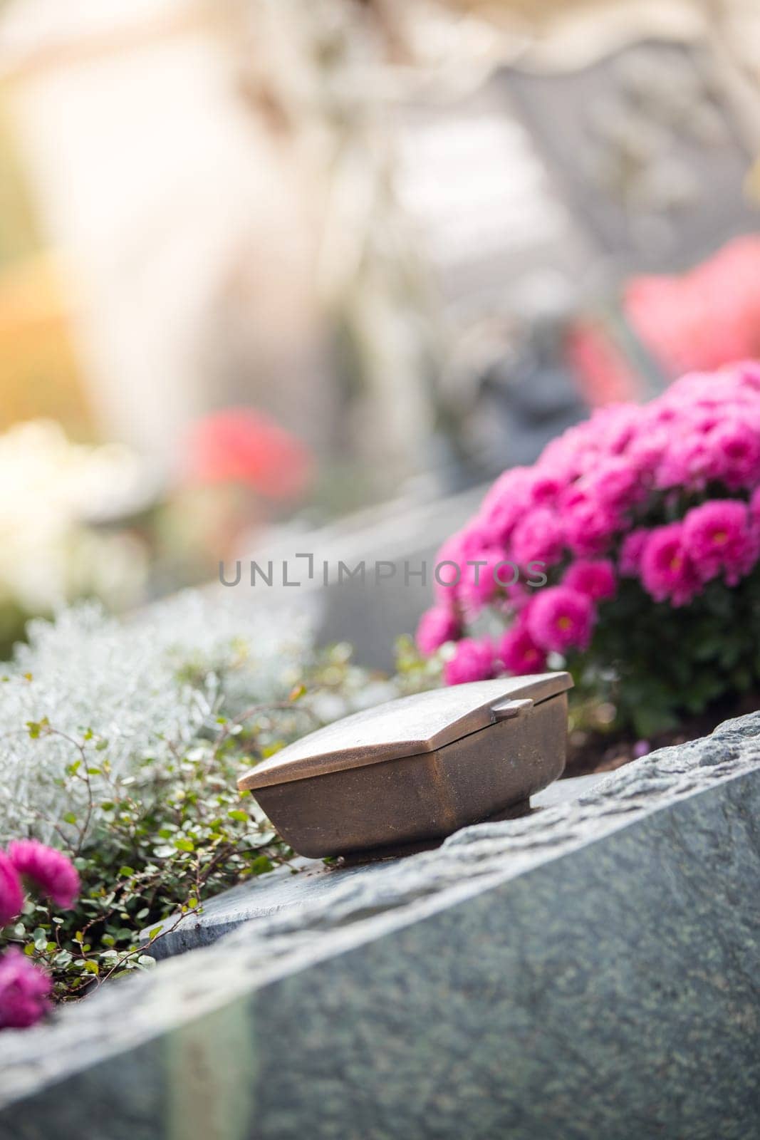 Holy water in iron bowl, cemetery