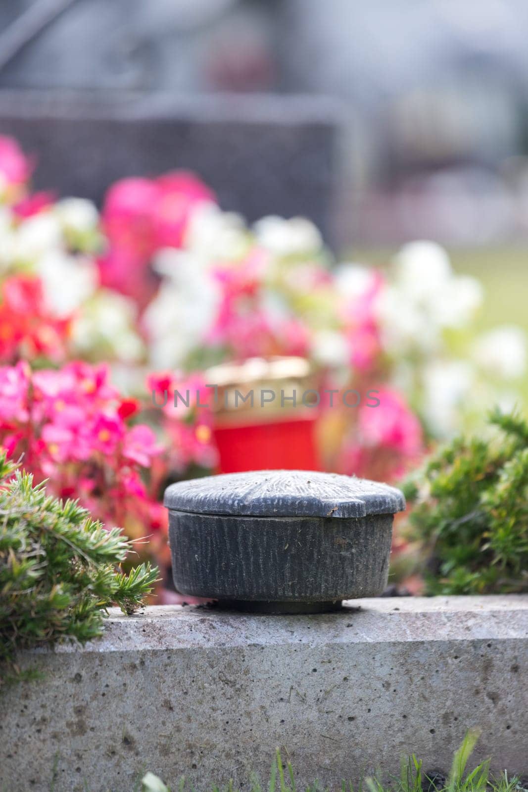 Holy water in iron bowl, cemetery