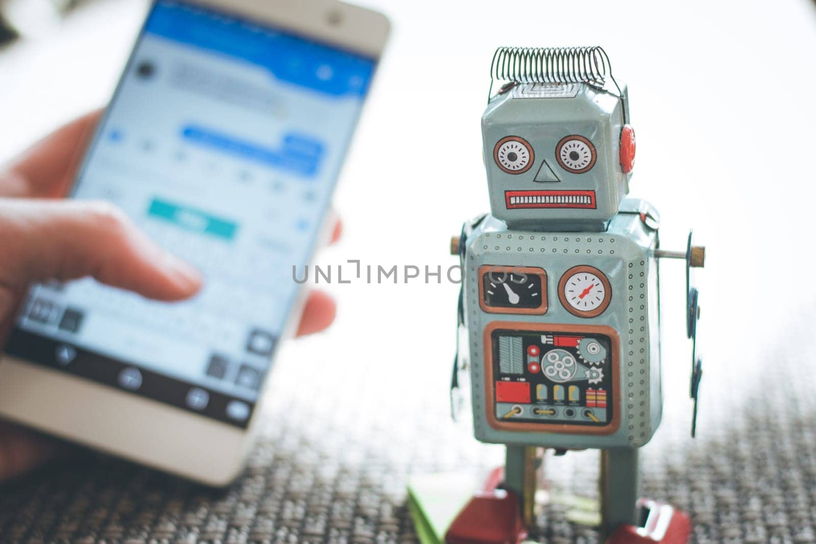 Symbol for chat bot, smartphone and messenger