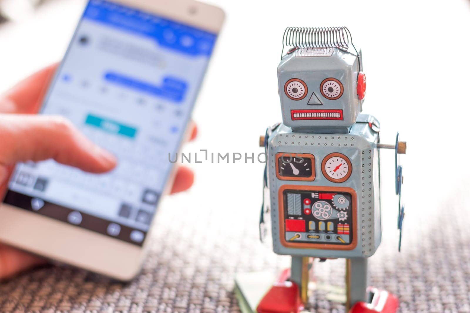 Symbol for chat bot, smartphone and messenger