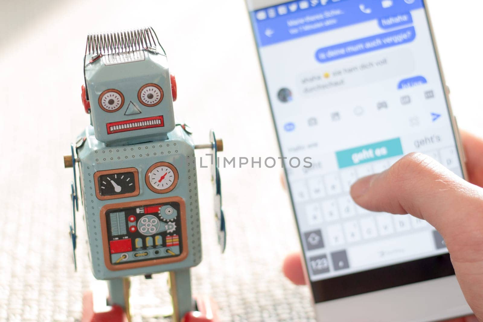 Symbol for chat bot, smartphone and messenger