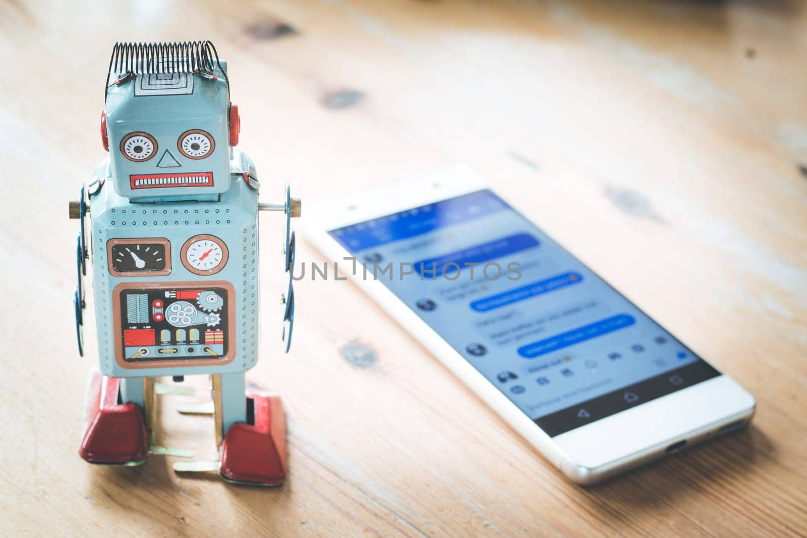 Symbol for chat bot, smartphone and messenger