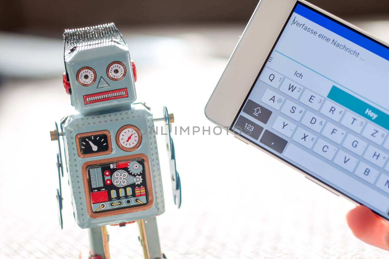 Symbol for chat bot, smartphone and messenger