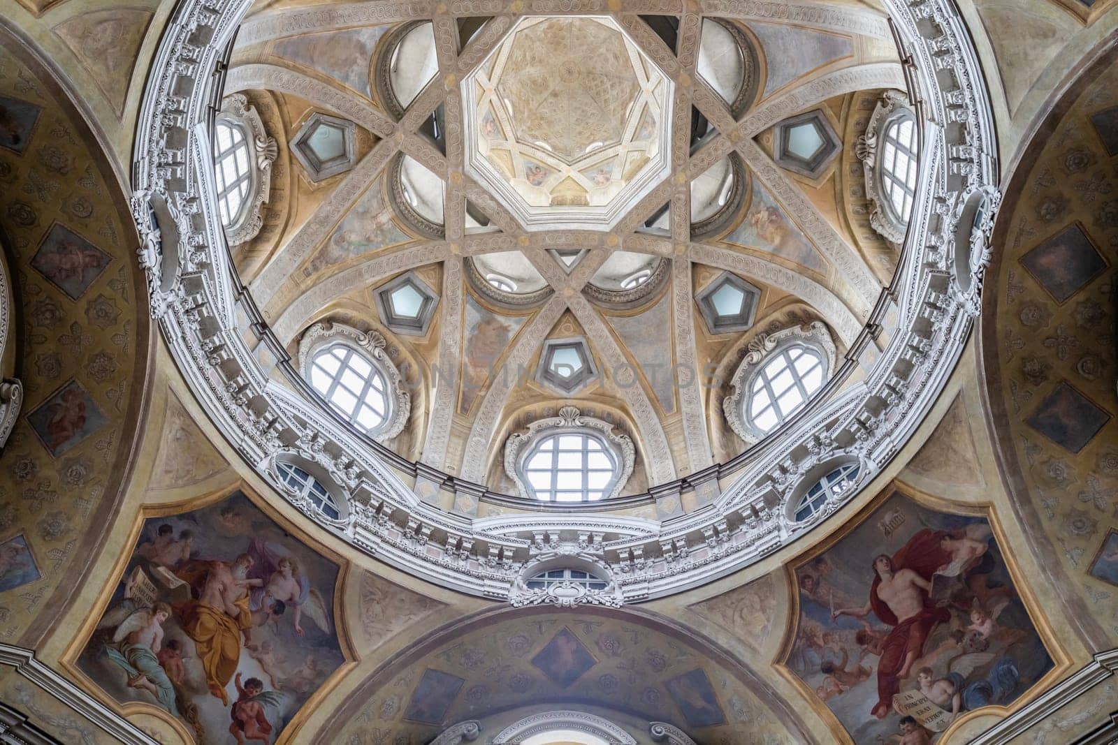 TURIN, ITALY - CIRCA MAY 2021: Antique baroque interior with vintage decoration. Royal Church of San Lorenzo (St. Lawrence).