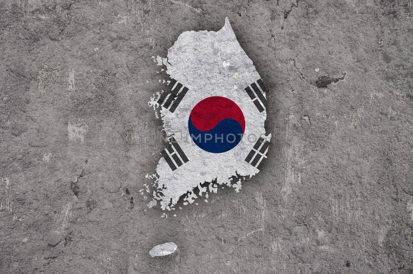 Map and flag of South Korea on weathered concrete