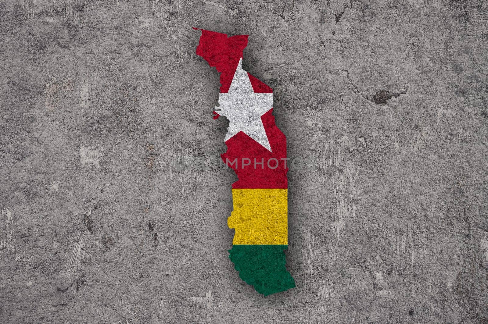 Map and flag of Togo on weathered concrete