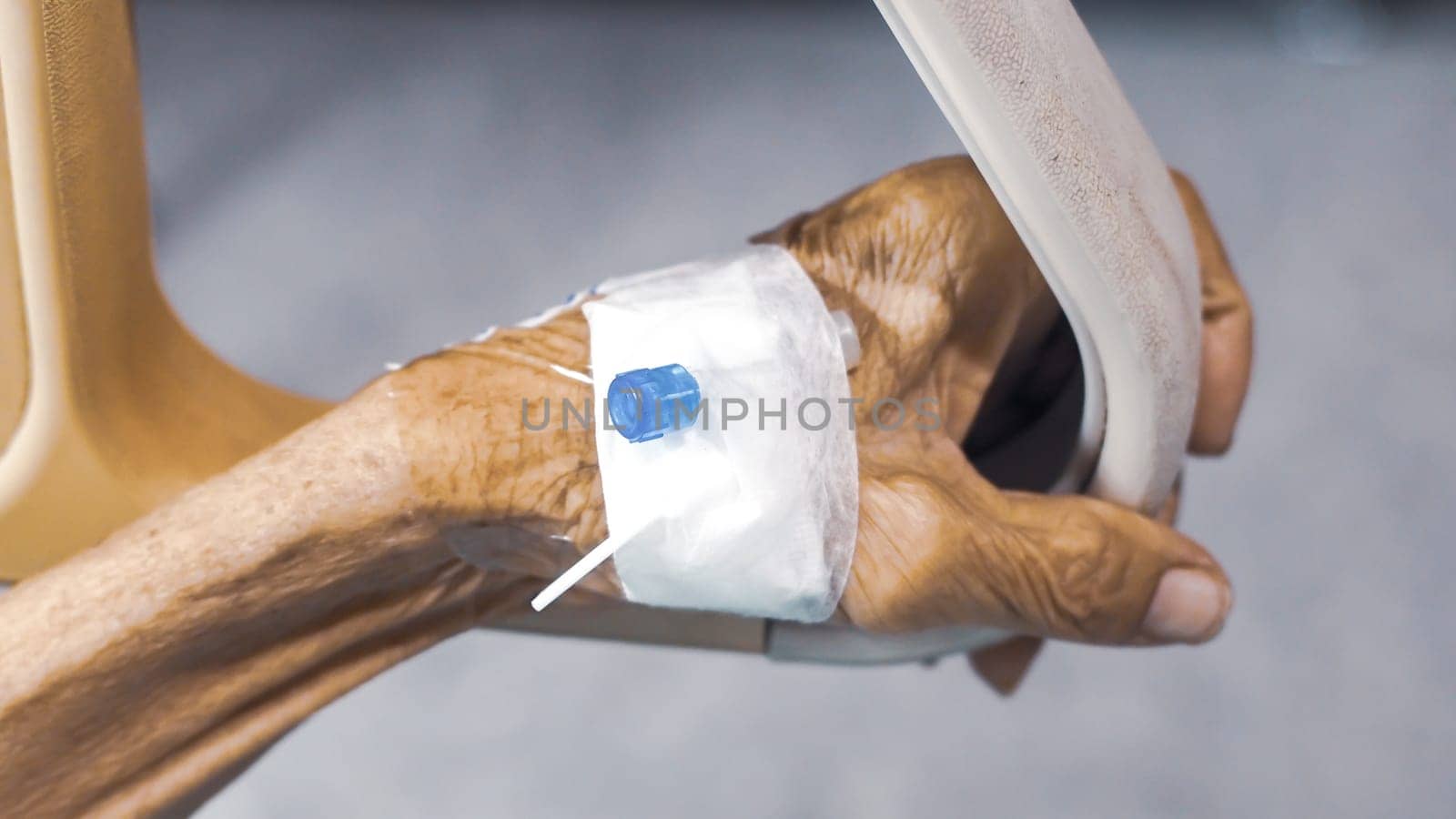 Healthcare and medical concept. Elder with injection needle