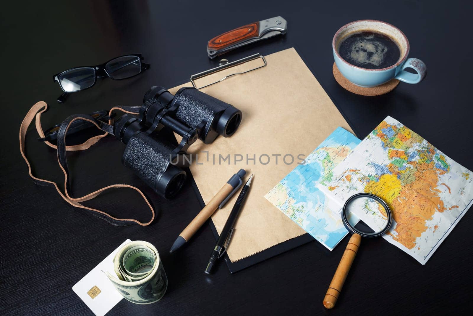 Planning vacation trip with map. Stuff for travel.