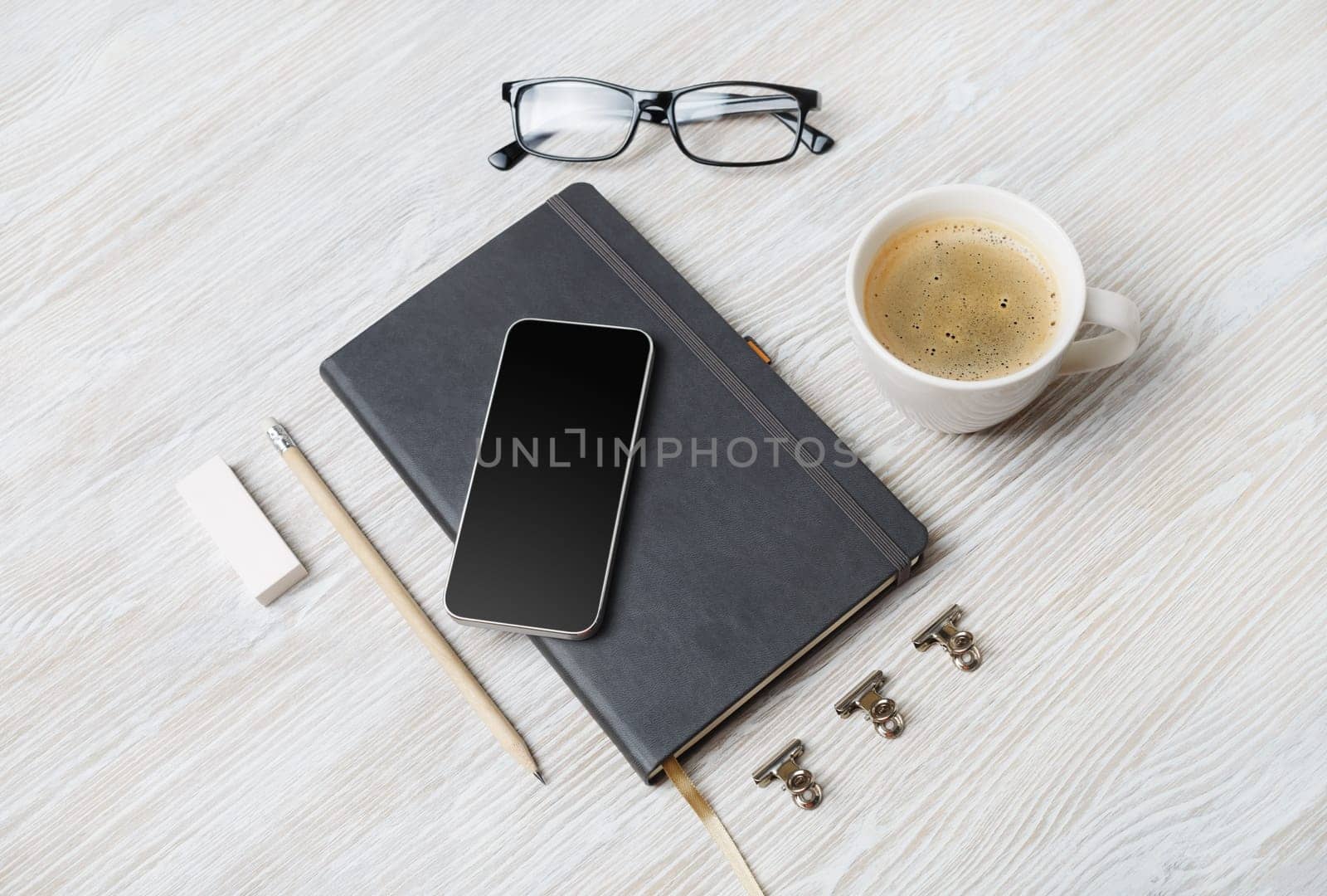 Photo of blank stationery on light wooden background. Template for placing your design. Mockup for ID.