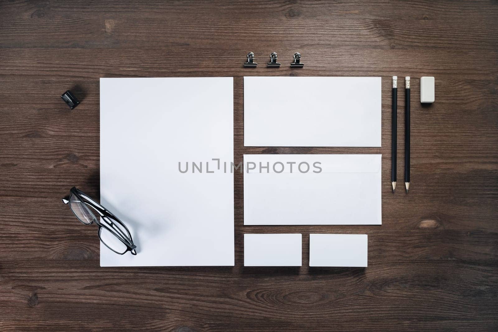 Blank stationery set on wooden background. ID template. Mockup for branding identity for designers. Flat lay.