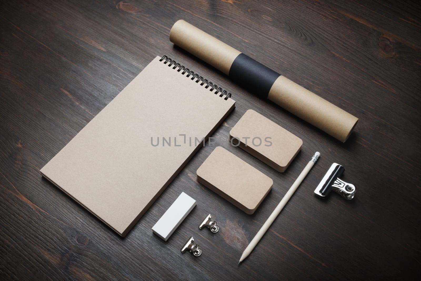 Vintage corporate identity mockup. Blank stationery set on wood table background. Responsive design template.