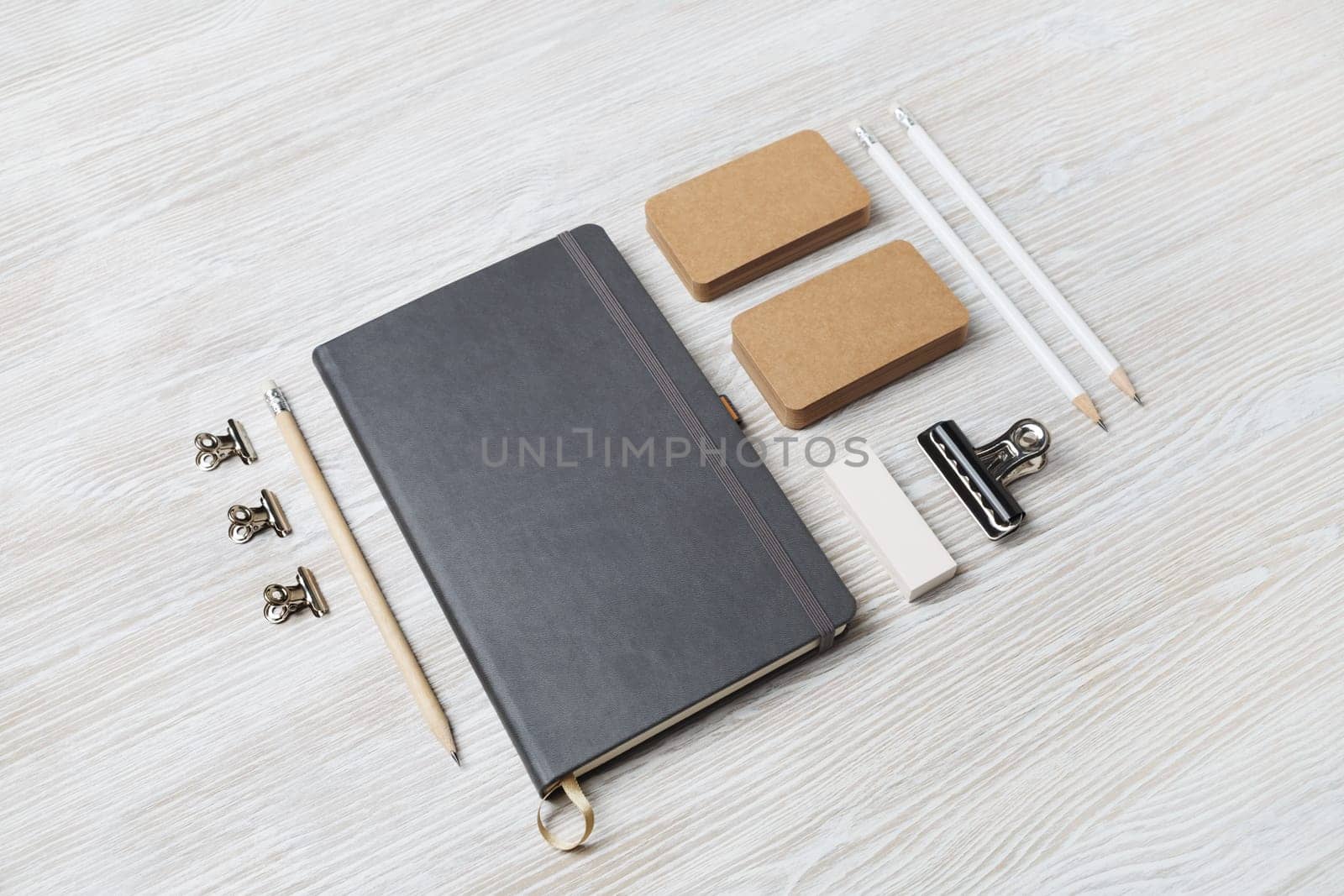 Corporate identity template. Branding mock up. Blank business stationery mock-up on light wood table background.
