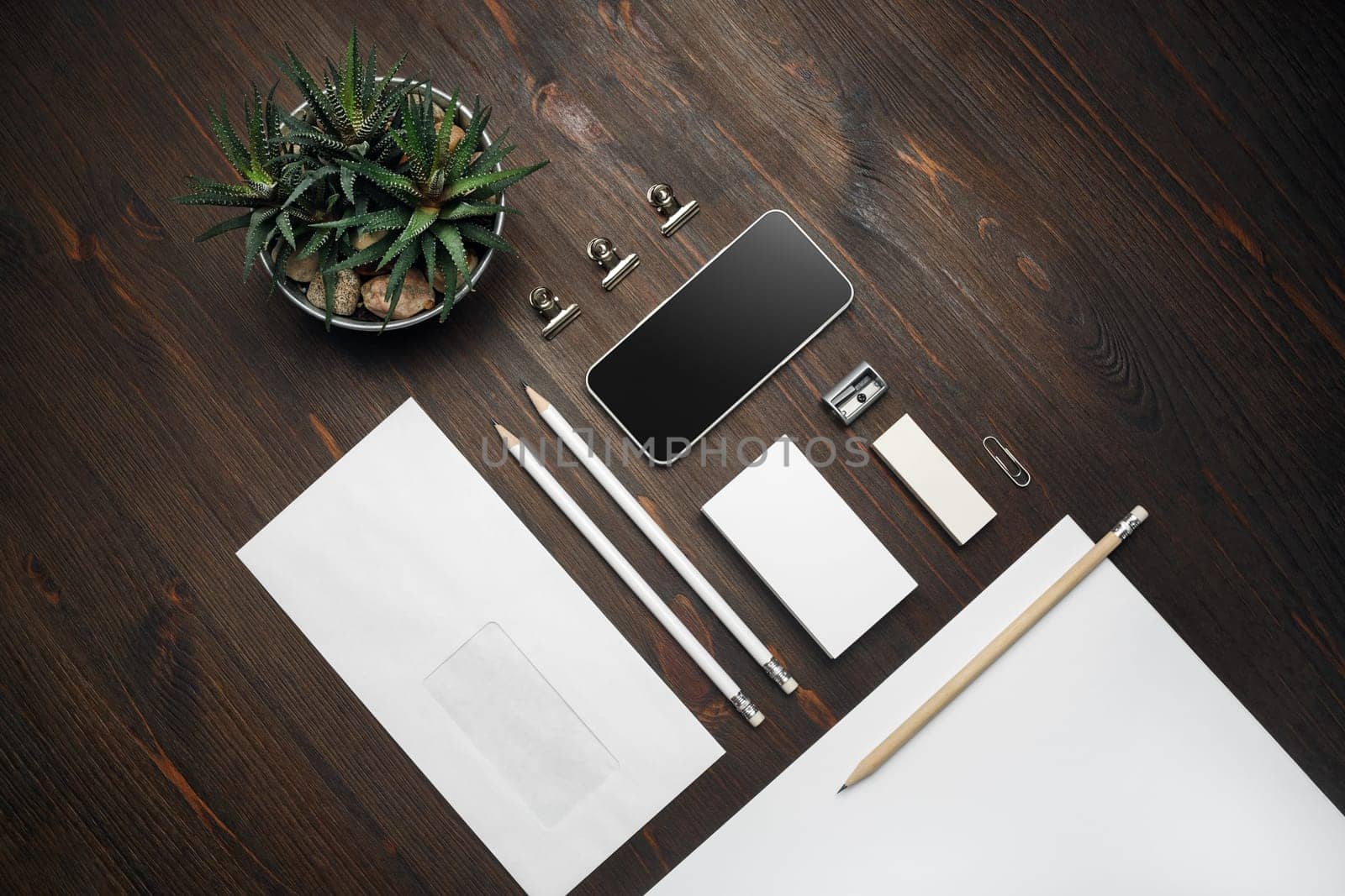 Blank corporate stationery for branding design. Corporate identity set on wooden background. Flat lay.