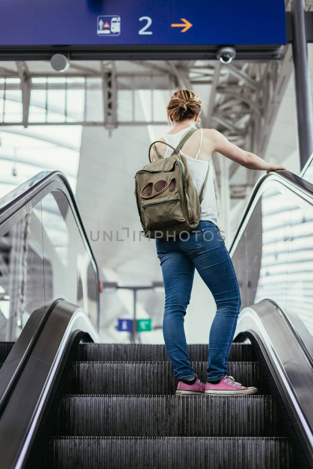 Young girl at the train station, travelling
