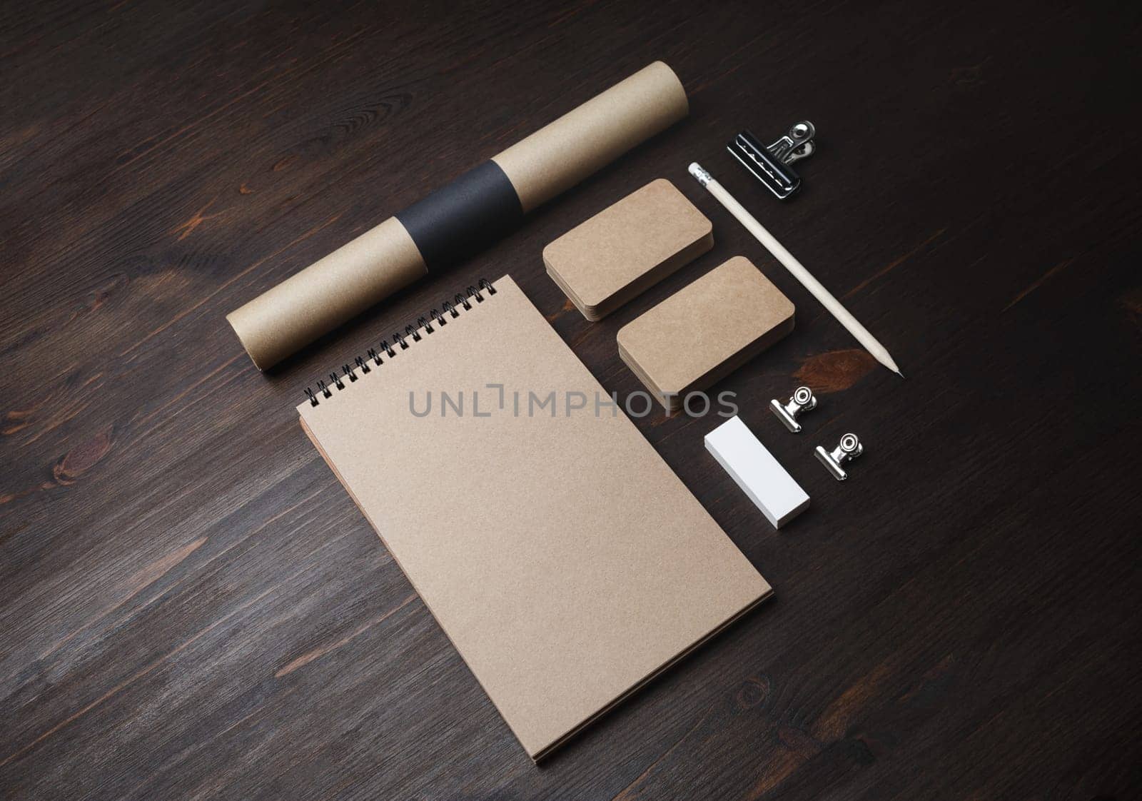 Vintage branding mock up. Photo of blank corporate stationery on wooden background.
