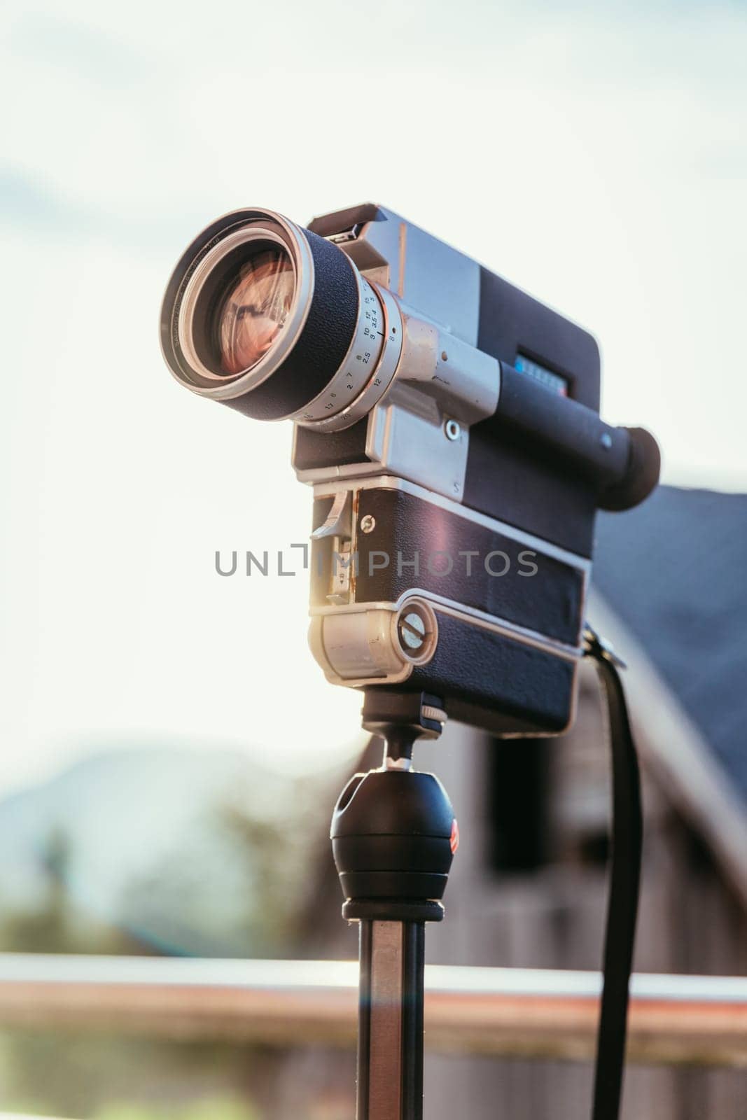 Vintage old movie camera, outdoor, sunset
