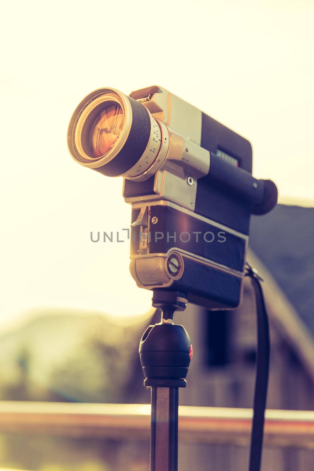 Vintage old movie camera, outdoor, sunset