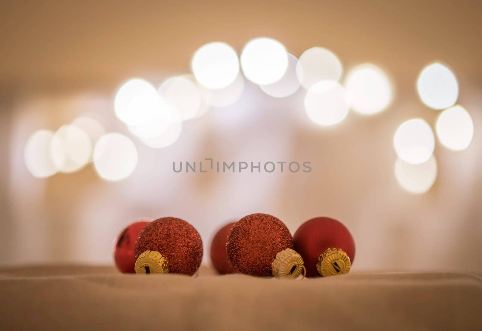 Red Christmas balls with decoration on shiny background