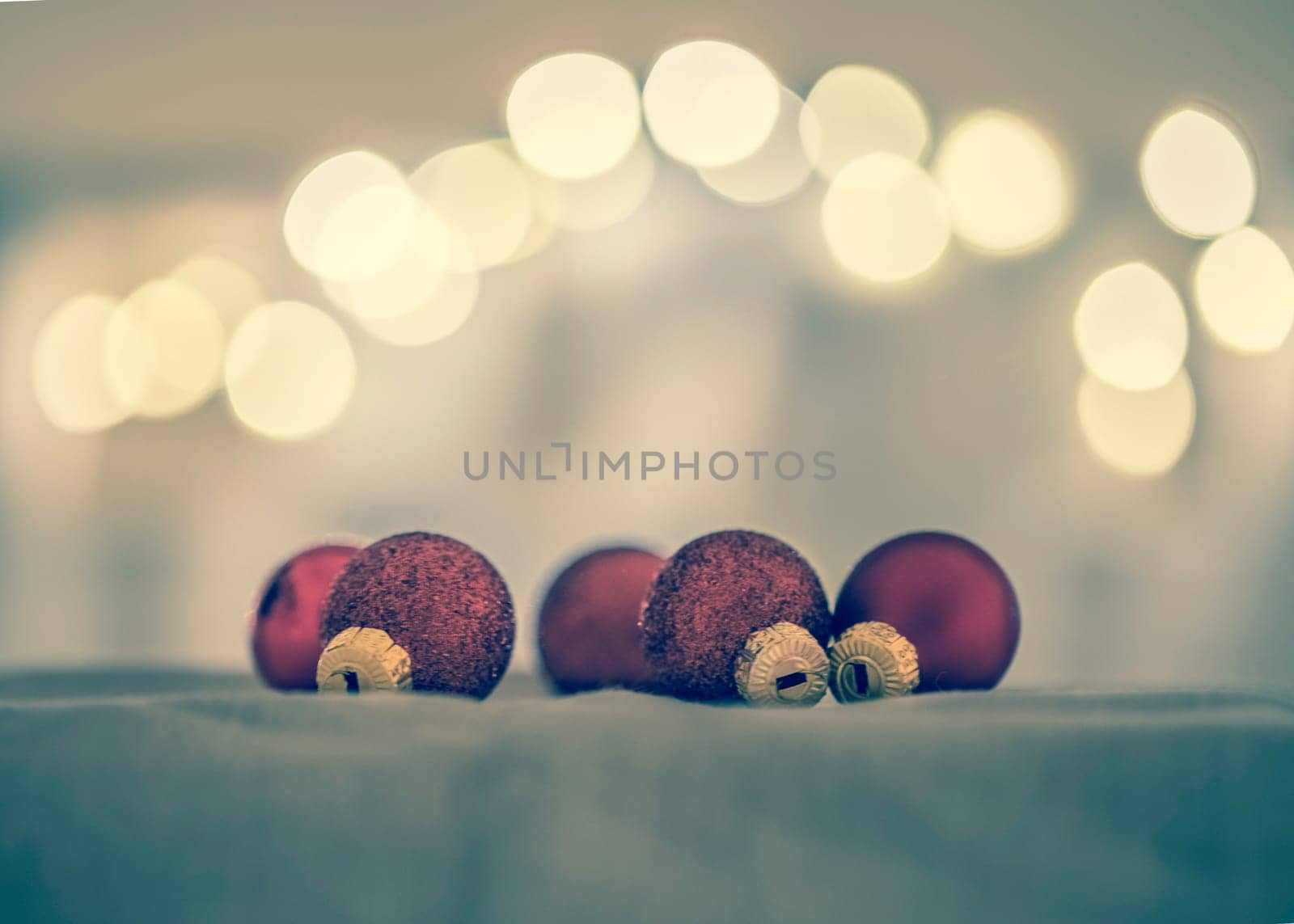 Red Christmas balls with decoration on shiny background