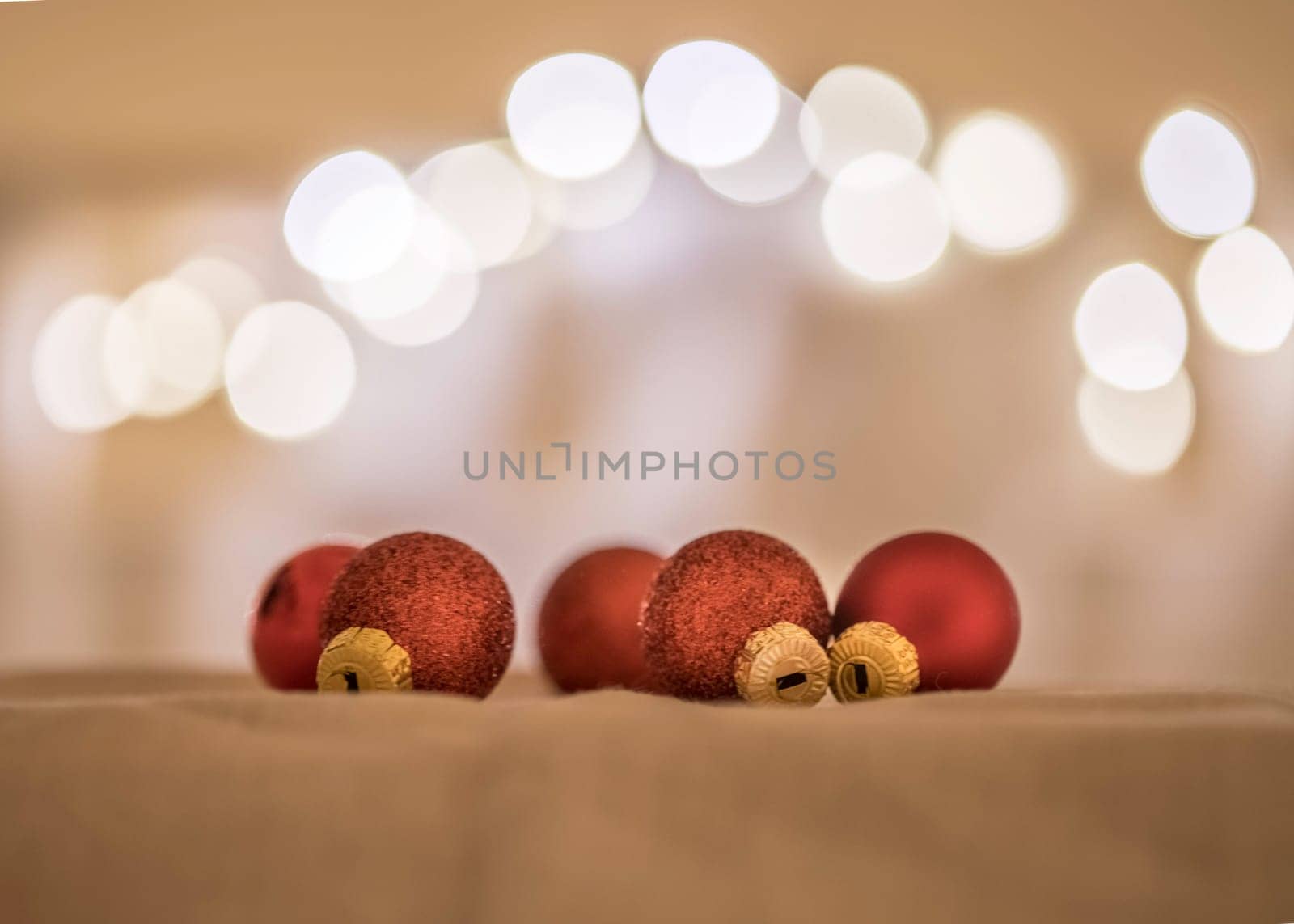 Red Christmas balls with decoration on shiny background