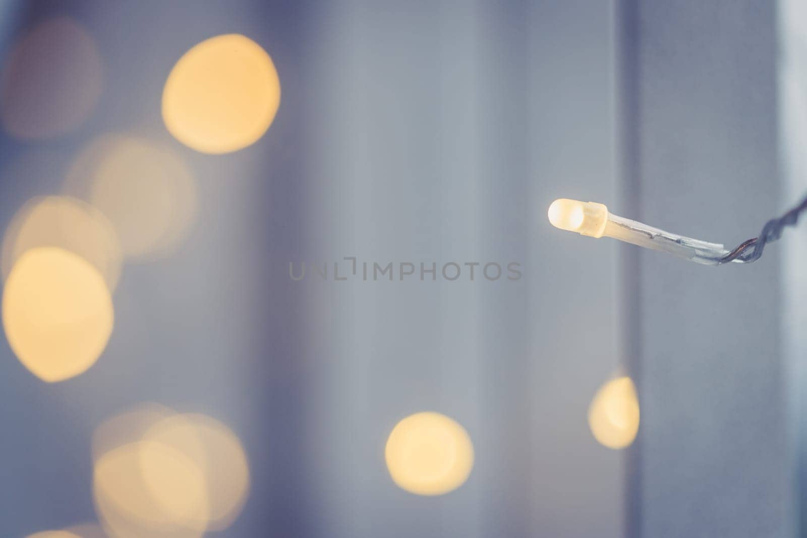 Closeup picture of christmas lightning and decoration, shiny background