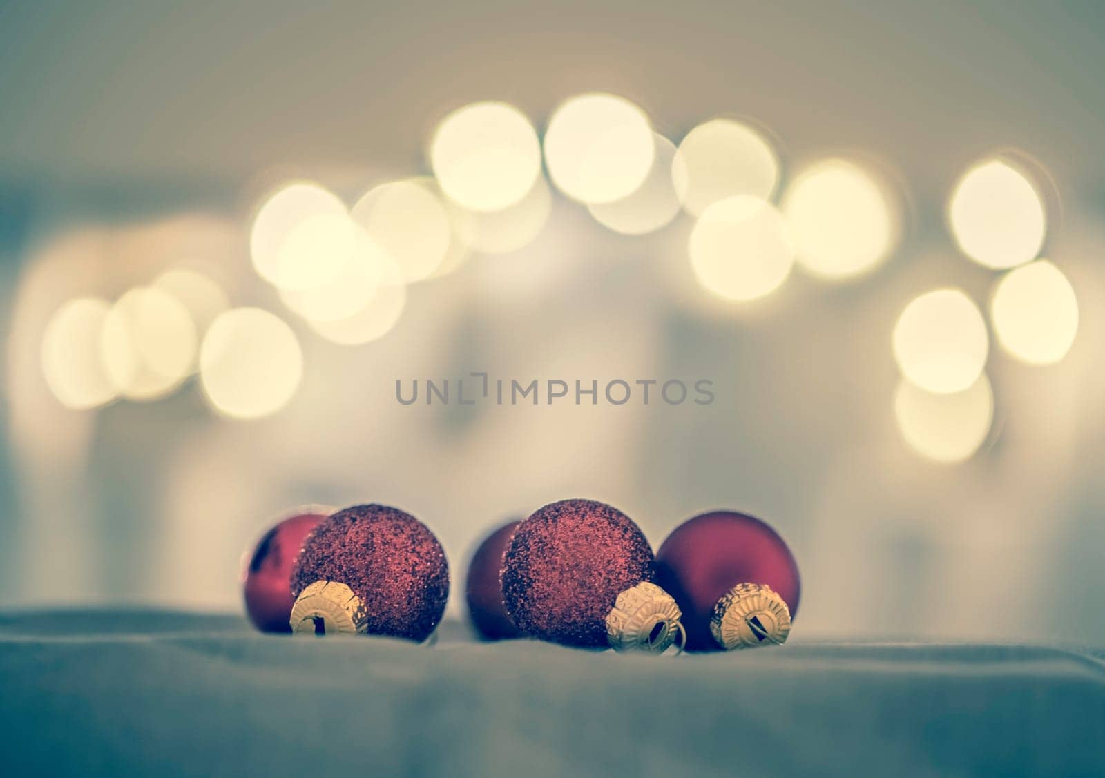 Red Christmas balls with decoration on shiny background