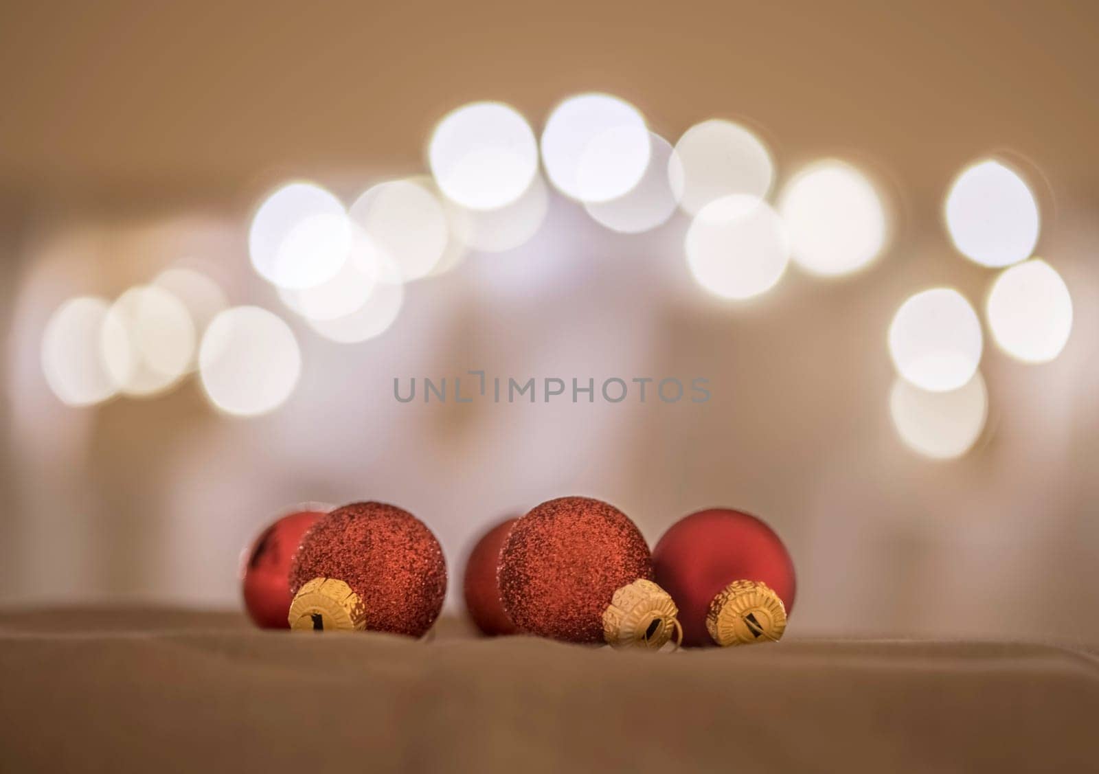 Red Christmas balls with decoration on shiny background