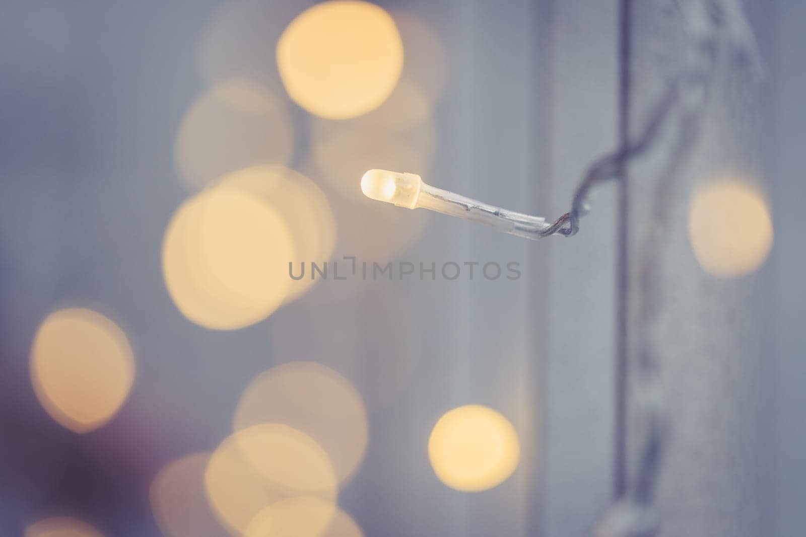 Closeup picture of christmas lightning and decoration, shiny background