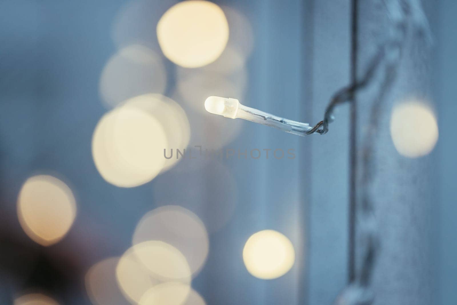 Closeup picture of christmas lightning and decoration, shiny background