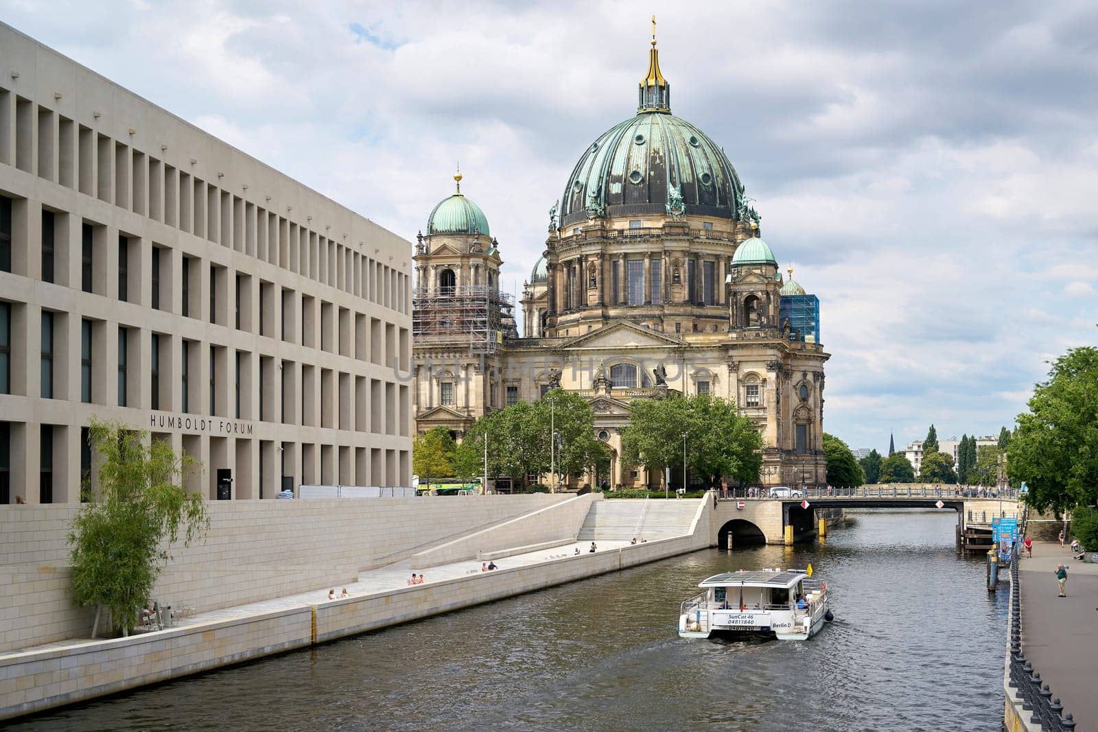 Spree River in Berlin with newly built Humboldt Forum (Stadtschloss) and historic Berlin Cathedral