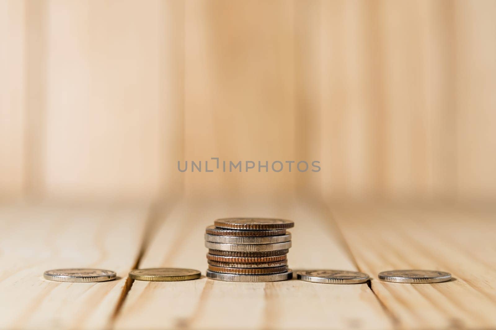 Save money and account banking for finance concept, Coins stack in bottle on blurred background