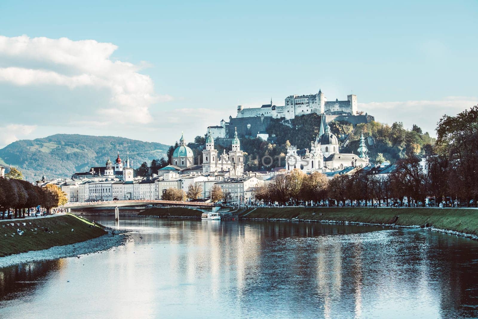 Salzburgs old city with fortress Hohensalzburg, blue sky