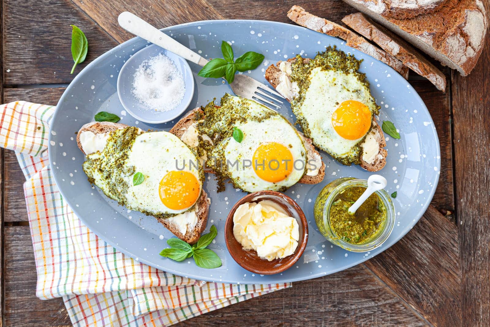 Pesto eggs, eggs, fried in basil pesto , sunny side up