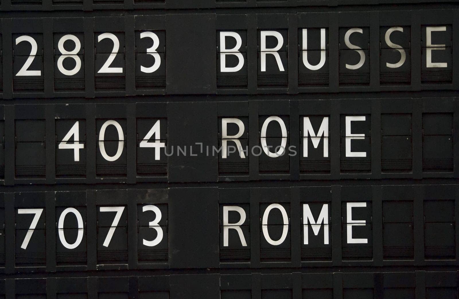 Flight information board in airport terminal