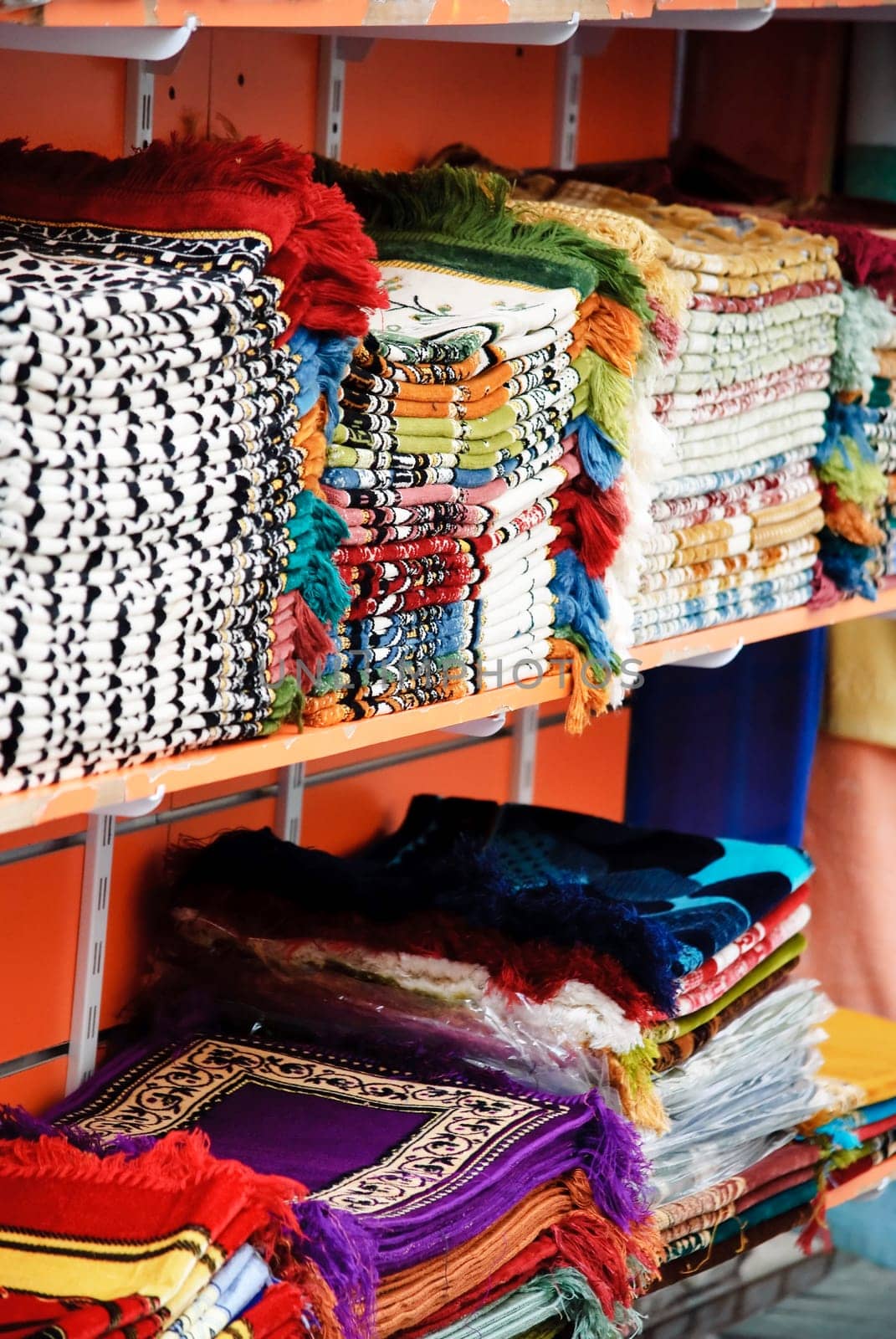 Colorful rugs selling at old souk in Dubai