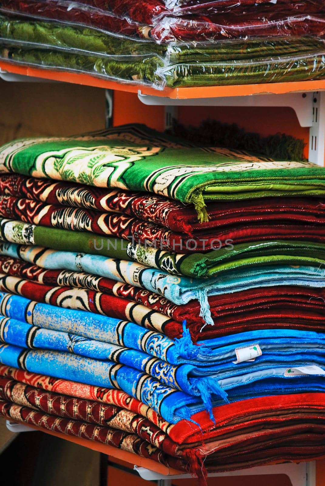 Colorful rugs selling at old souk in Dubai