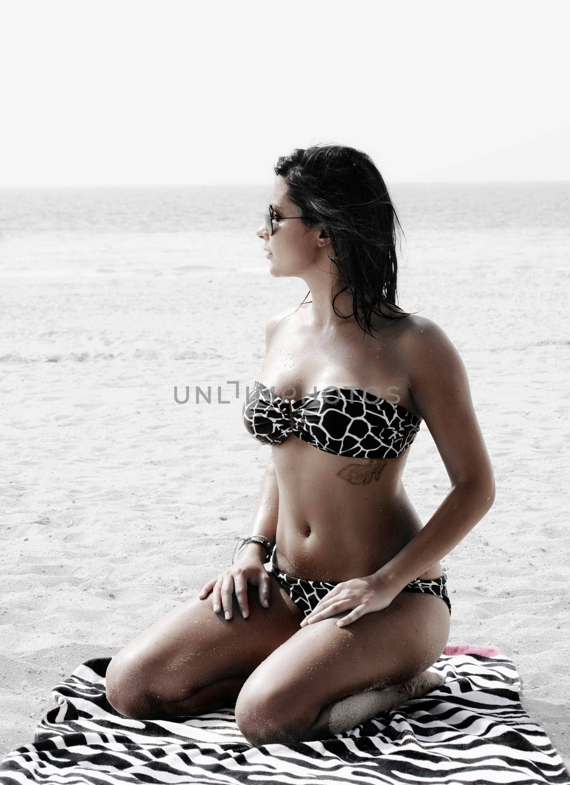 Fashion shot of beautiful woman on the beach in Dubai