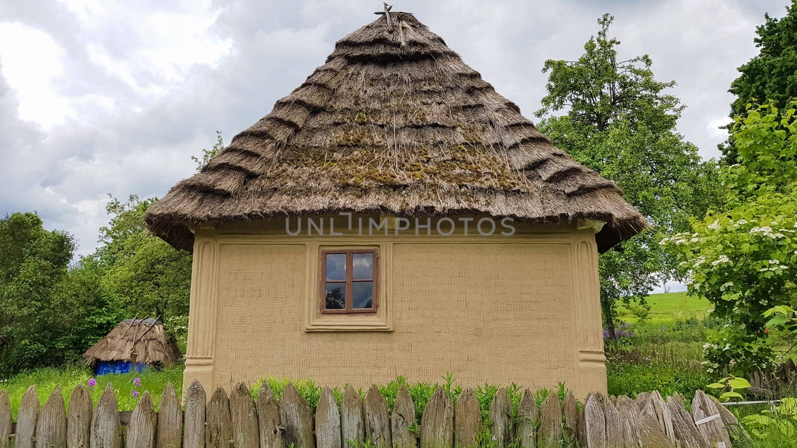 Ukraine, Kiev - June 11, 2020. The old house of peasants in the museum Pirogovo. National Museum of Folk Architecture and Everyday Life of Traditional Folklore Houses of Different Regions of Ukraine.