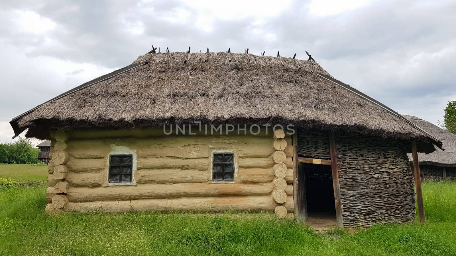 Ukraine, Kiev - June 11, 2020. The old house of peasants in the museum Pirogovo. National Museum of Folk Architecture and Everyday Life of Traditional Folklore Houses of Different Regions of Ukraine.