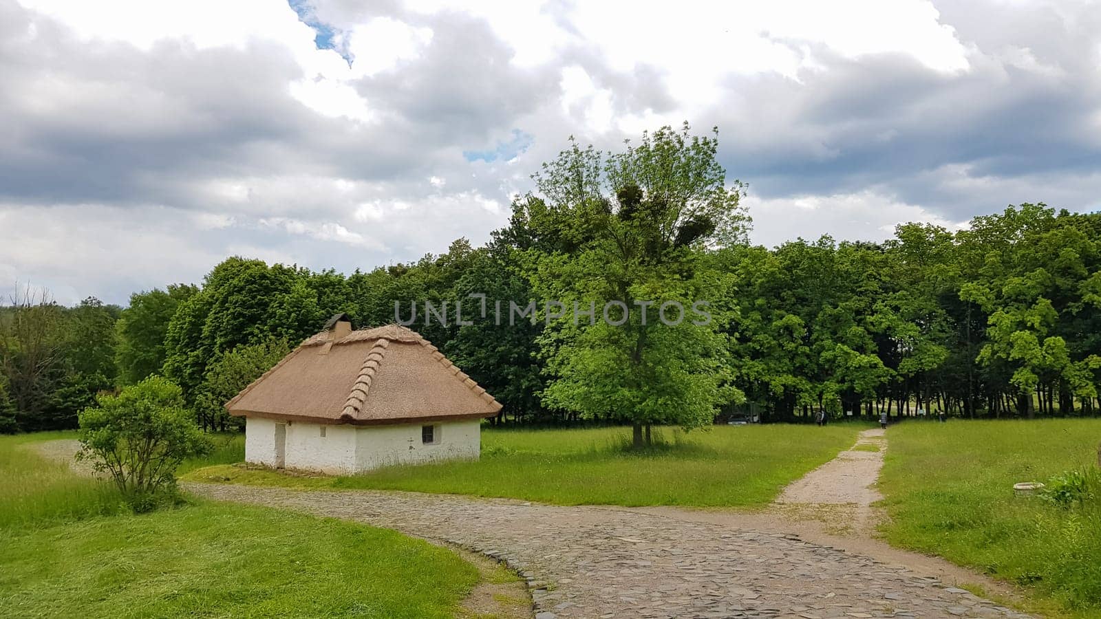 Ukraine, Kiev - June 11, 2020. The old house of peasants in the museum Pirogovo. National Museum of Folk Architecture and Everyday Life of Traditional Folklore Houses of Different Regions of Ukraine.